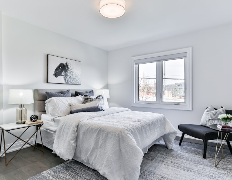 Furnished bedroom with a double bed and side tables