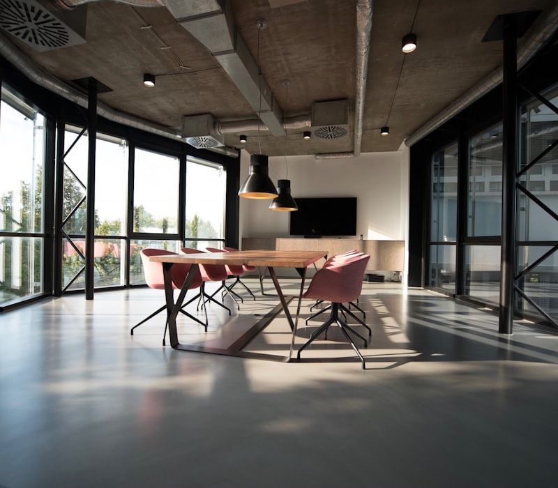 Meeting room with a boardroom table and chairs